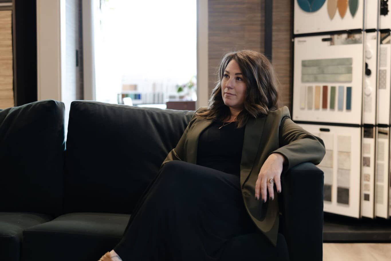 Renee Fyall, interior designer and owner of D Marie Interiors, seated in the Ellensburg design studio